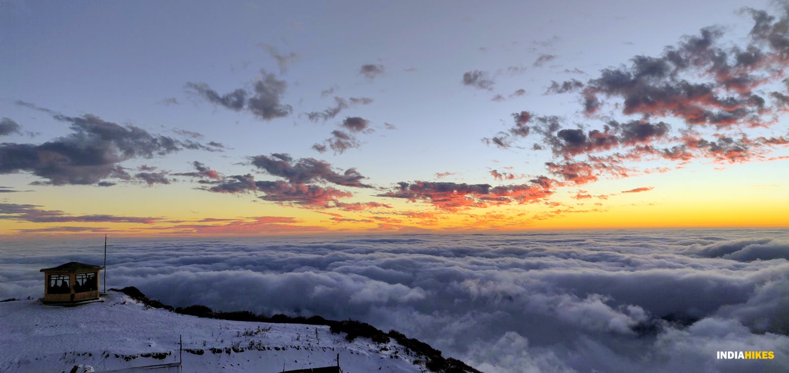 801bace5 95cf 417b b8d1 bca46c21480b sandakphu phalut   aakash g ratkal   gazebo sitting at the perfect union of snow and sea of clouds